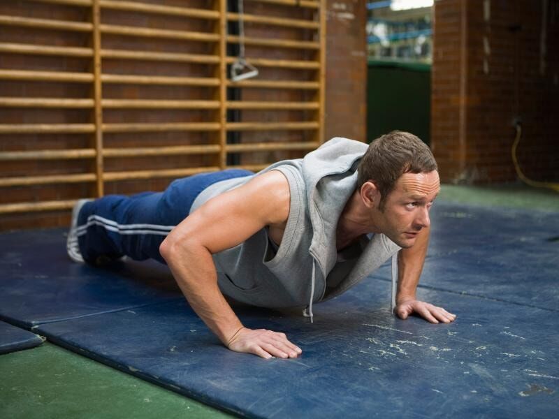 man doing body weight pushups