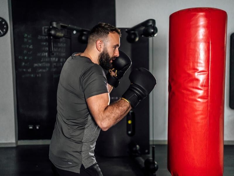 man boxing in gym