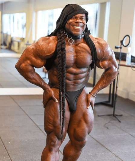 kai greene biceps pose