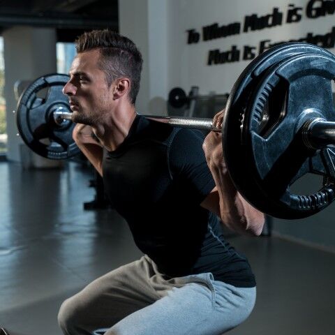 Pushing off the floor during barbell squat