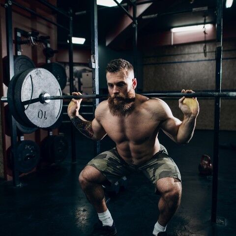 Barbell squat sitting down technique